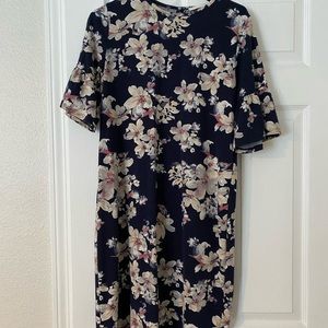 Medium floral dress with bell sleeves. Smoke free and pet free home